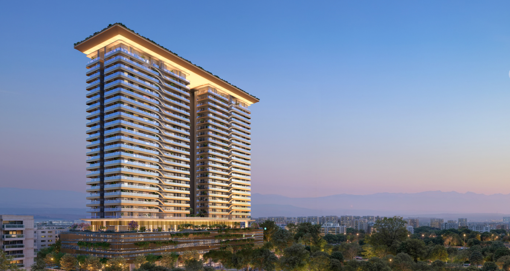 TREVOC Royal Residences twin towers at dusk